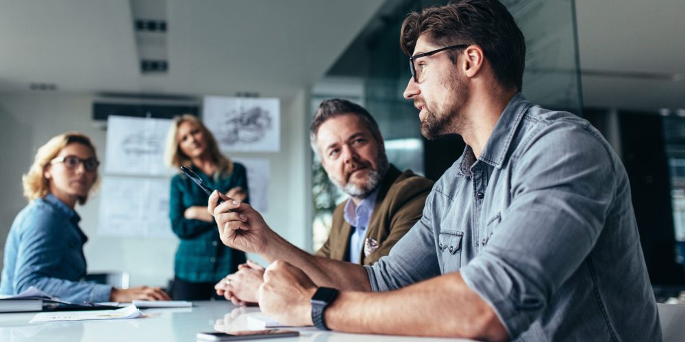 Team of professionals discussing over new business project